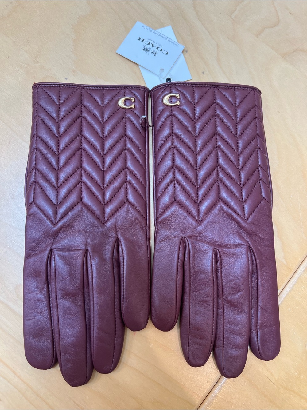 Coach Quilted Chevron Leather Gloves in Burgundy with Gold C Hardware size 7